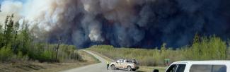wildfire smoke over a road