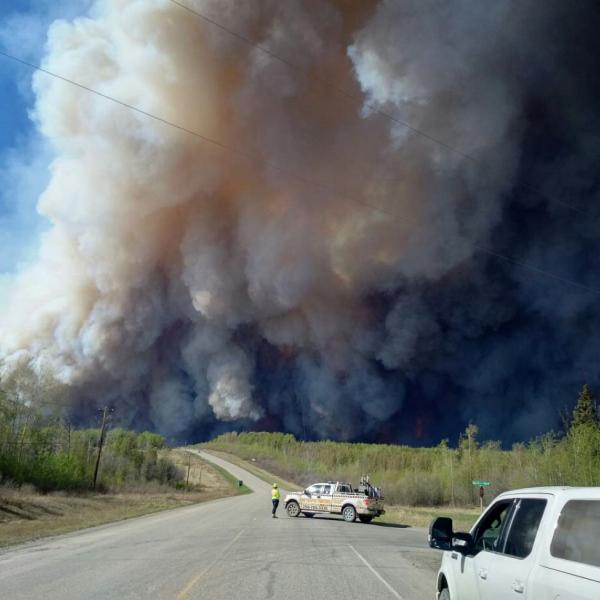 wildfire smoke over a road